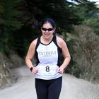 Cavy Dolphins team member Celia Lie contests the second leg of the Peninsula Relay on Saturday,...