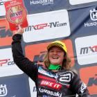 Courtney Duncan celebrates on the podium after winning the penultimate race of the season in...
