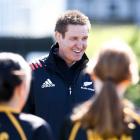 Black Ferns coach Glenn Moore speaks to members of the Wellington Girls' College team during...