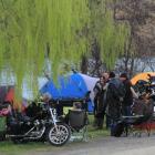 Under the trees at Parsons Rock, about 700 motorcycle riders sort out their campsites late on...