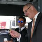 Minister Phil Twyford catches a Queenstown bus, driven by Mandeep Singh. PHOTO: DAISY HUDSON

