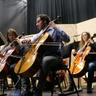 Joshua Frear, principal player in the Dunedin Symphony Orchestra's cello section, performs at the...