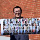 Happy Moose founder and chief executive Alex Dong displays a collage poster created at his photo...