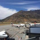 Air New Zealand and Jetstar planes on the tarmac at Queenstown Airport. Photo: Mountain Scene