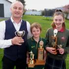 Winning speech makers: Phil, Leon and Taymah Wheeler with their haul of trophies. Photo: Mick Jensen