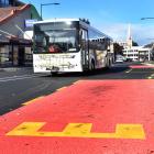 A bus drives past the bus hub in Great King St between Moray Pl and St Andrew St. Photo: Peter...