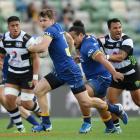 Otago fullback Michael Collins had a barnstorming first-half, crossing the line twice. Photo:...