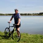 Geoff Spark beside the irrigation lake at his dairy farm in Eyrewell, which will be the base for...