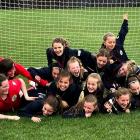 The winning Southland United under-12 girls team was greeted by supportive family members who...