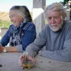 Oturehua writers Jillian Sullivan and Brian Turner are flanked by some of their beloved Central...
