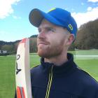New Otago batsman Nick Kelly surveys the looming clouds at the University of Otago Oval yesterday...