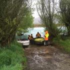 Crews prepare to launch a pair of jet boats into the Waitaki River near Duntroon in the search...