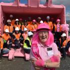 Ada Birtle, of the Palmerston Lions Club and Pink Ribbon appeal, with 22 engineers, painters and...