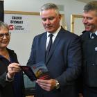 Viewing a brochure related to the employment of inmates at the Otago Correctional Facility...