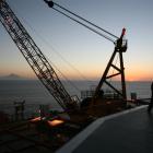 The hardware of the Taranaki oil and gas industry, offshore rigs and onshore processing stations.