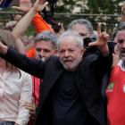Former Brazilian President Luiz Inacio Lula da Silva arrives to deliver a speech after being...