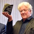 Receiving the Bluestone Award from Dunedin Mayor Aaron Hawkins (left) for his work in restoring...