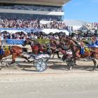 Driver Tim Williams salutes the Addington crowd as Chase Auckland wins the New Zealand Free-For...