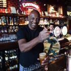 Having a crack at pouring a pint at Emersons in Dunedin yesterday is Shaun Wallace, of the...