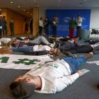 Youth for Climate activists  stage a die-in to demand more ambitious climate change goals by EU...