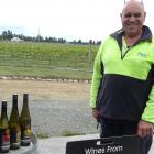 CharRees owner Charlie Hill with a selection of bottled wine made from grapes grown in Ashburton...