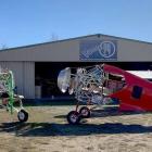 Two of the Beechcraft Staggerwing aircraft being restored at Wanaka Airport by Twenty24  Ltd. The...