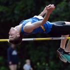 Tokomairiro High School pupil Millar McElrea competes in the high jump at the Caledonian Ground...