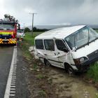 A van skidded into a ditch during a hailstorm. 