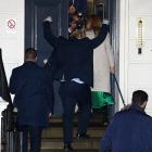 Britain's Prime Minister Boris Johnson reacts as he and his girlfriend Carrie Symonds arrive at...