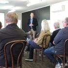 DairyNZ chief executive Tim Mackle discusses the dairy sector with farmers at the Oamaru ‘...