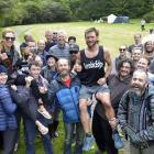 Cargill Crusher winners Sharon Lequeux and Adam Keen are held aloft at the end of the 24-hour...