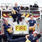 Ready to tackle any Christmas emergencies yesterday were a female Fire and Emergency New Zealand...