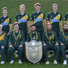 The champion Green Island cricket team. Dion Lobb is in the centre propping up the Bing Harris...