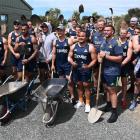 The 2020 Highlanders squad prepares to lend a hand at Orokonui Ecosanctuary yesterday. Photo:...
