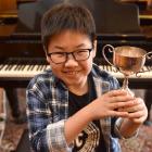 The multi-talented Nathanael Koh holds a recent composing award. Photo: Gregor Richardson