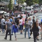Locals and cruise ship passengers contributed to the thousands of eager shoppers out in force in...
