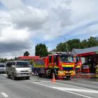 Police direct traffic in Ardmore St yesterday after traffic was reduced to one lane in each...