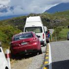 Roys Peak track parking is reducing the width of Mt Aspiring Rd. PHOTO: KERRIE WATERWORTH

