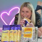Former Cadbury worker Megan Fairley sells the last 20 blocks of Dunedin Caramilk, plus a 1kg slab...