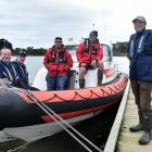 Coastguard Dunedin president John Campbell (right) with other members (from left) Scott Turner,...