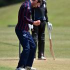 Carisbrook-Dunedin bowler Patrick Arnold celebrates trapping Kaikorai batsman Mitch Renwick lbw...