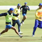 Otago keeper Max Chu passes the ball during a warm-up session at the University of Otago Oval...