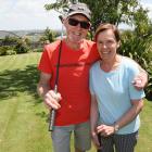 Barry and Helen Grant on their backyard mini-golf course. Photo: Geoff Sloan