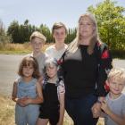 Angela Jones with Aria Hamilton-Petrie, 8, and her children Cody Jones, 11, Sienna Jones, 8,...