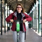 Sophie Reymondin, of Tauranga, goes for a spin on a Lime scooter during a visit to Dunedin...