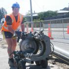 Central Otago District Council contractor Michael Harvey is all smiles yesterday as work on the...