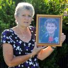 Ngairena Hartman holds a photo of her son Todd Campbell. Photo: ODT files