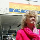 Frustrated Oamaru business owner Jan Nuttall will clean graffiti off her lower Thames St building...