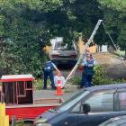 Queenstown police arrest a man in Yewlett Cres, Frankton, yesterday. Photo: Supplied