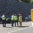 Emergency services at the crash scene this afternoon. Photo: Guy Williams